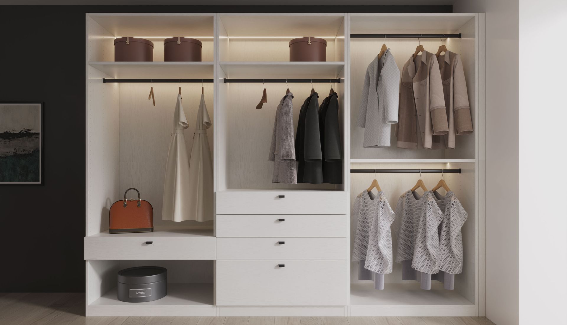 A white vesto form custom wardrobe with warm integrated lighting, soft-close drawers and full-height hanging